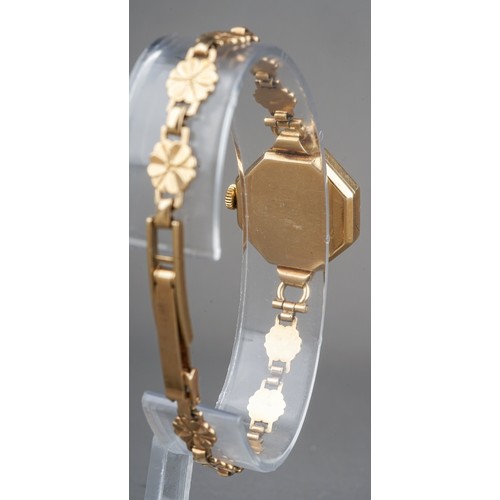 257 - 9 ct gold ladies Tudor Royal wristwatch, on 9 ct gold strap, currently ticking. Gross weight 17g.