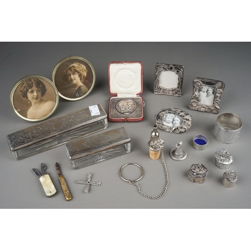 267 - A group of silver to include: two various early 19th Century silver mounted travelling case glass bo... 