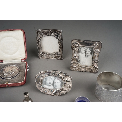 267 - A group of silver to include: two various early 19th Century silver mounted travelling case glass bo... 