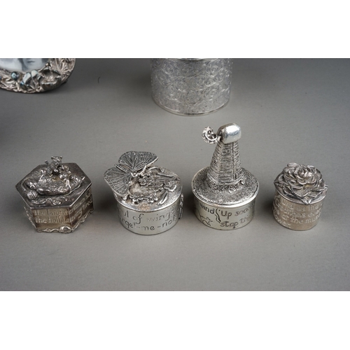 267 - A group of silver to include: two various early 19th Century silver mounted travelling case glass bo... 