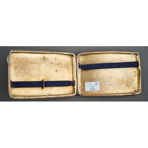 275 - A George V silver engraved cushion shaped cigarette case, gilt interior, hallmarked J Gloster Ltd, B... 