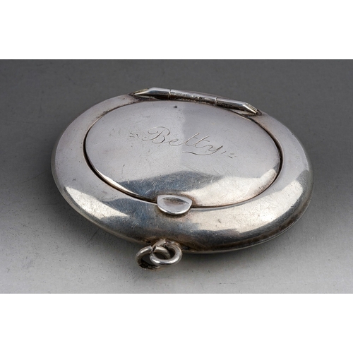 277 - An Edwardian silver oval pill \ powder puff locket on suspension chain, the cover scratched 