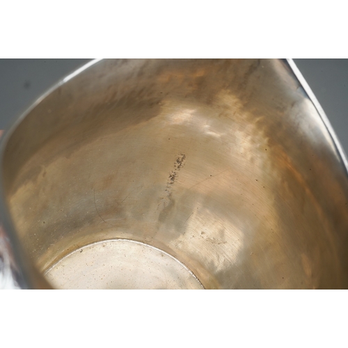 280 - A George III silver bright-cut engraved helmet shaped cream jug, hallmarked by WH possibly William H... 