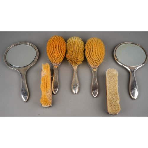 289 - A collection of early 20th Century silver mounted dressing table items to include: two mirrors, five... 