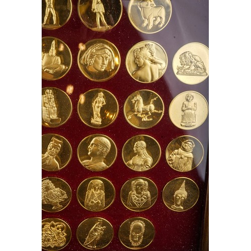 298 - Franklin Mint Collection of the World's Greatest Sculptures  50 Coins, Comes in case measuring 23 1/... 