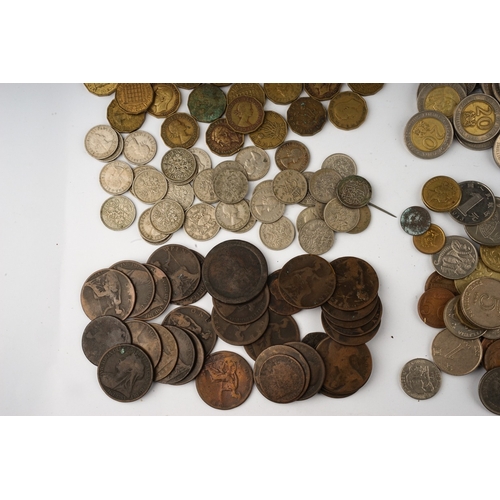 310 - Large quantity of British and European coinage to include pennies ect.