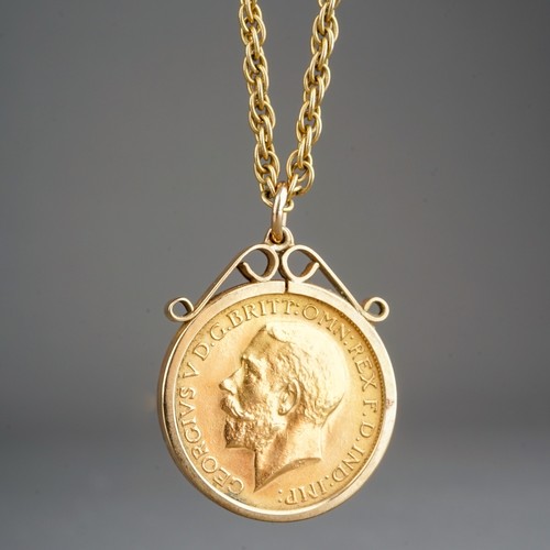 315 - 1927 full sovereign in 9 ct gold mount with 9 ct gold chain, gross weight 16.4g