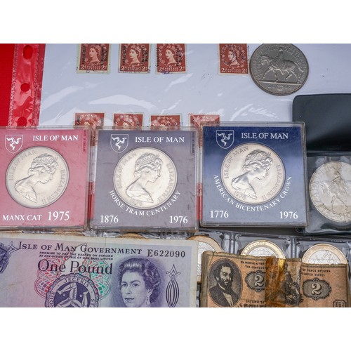 319 - A collection of coins and stamps in folder and loose, coins include fifty seven £2 coins, approximat... 