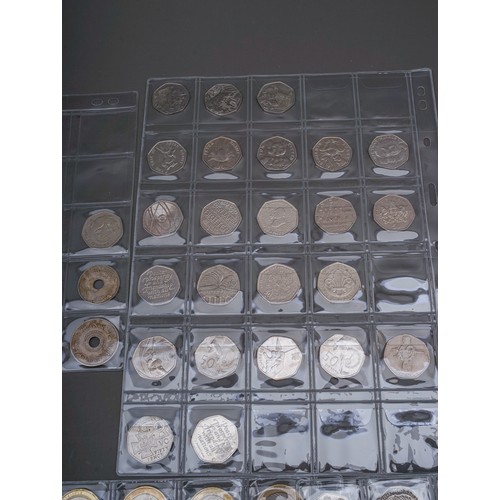 319 - A collection of coins and stamps in folder and loose, coins include fifty seven £2 coins, approximat... 