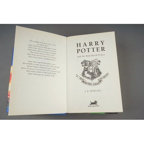 321 - J. K Rowling, Nine Harry Potter hardback books, comprising the first three books (Philosophers Stone... 