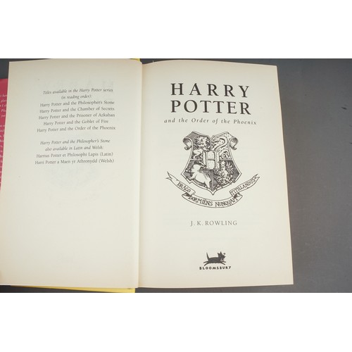 321 - J. K Rowling, Nine Harry Potter hardback books, comprising the first three books (Philosophers Stone... 