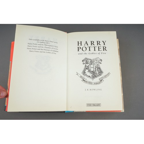 321 - J. K Rowling, Nine Harry Potter hardback books, comprising the first three books (Philosophers Stone... 