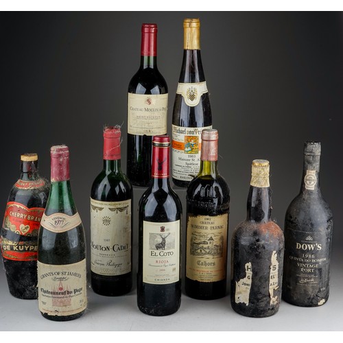 323 - Nine bottles of port, whisky and wine, comprising Dow's 1986 Quinta Do Bomfim vintage port, a bottle... 