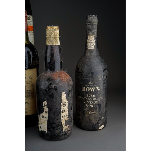 323 - Nine bottles of port, whisky and wine, comprising Dow's 1986 Quinta Do Bomfim vintage port, a bottle... 