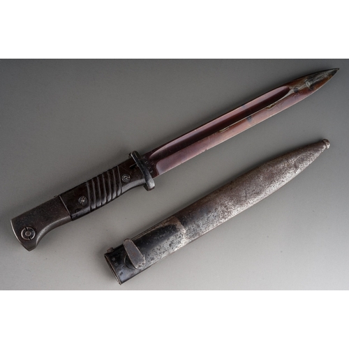 330 - A WW2 Third Reich Mauser K98 bayonet by Berg & Co  complete with scabbard, with matching serial numb... 