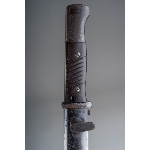 330 - A WW2 Third Reich Mauser K98 bayonet by Berg & Co  complete with scabbard, with matching serial numb... 