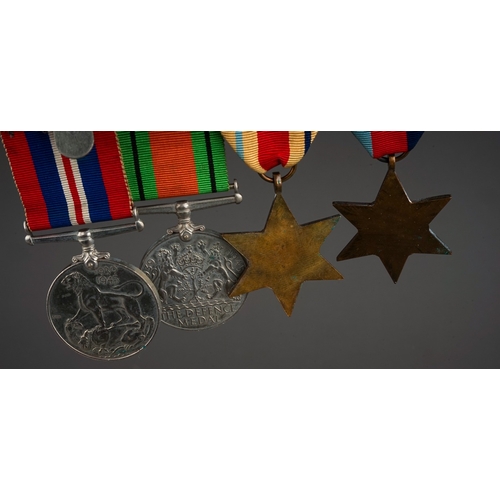 336 - A cased Elizabeth II Faithful Service medal awarded to Edwin Woodhall Strachan, with spare ribbon, a... 