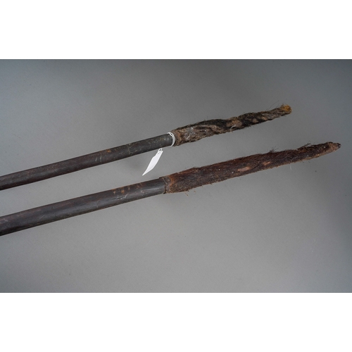 346 - Pair of African wire bound Assegi type spears, both with bound repairs, approx. 125-135 cm long