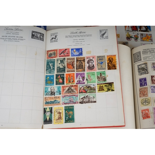 352 - A collection of stamps housed in a ring bound folder, a Godden Royal Mail album, a Quickchange album... 