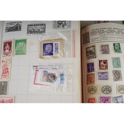 352 - A collection of stamps housed in a ring bound folder, a Godden Royal Mail album, a Quickchange album... 