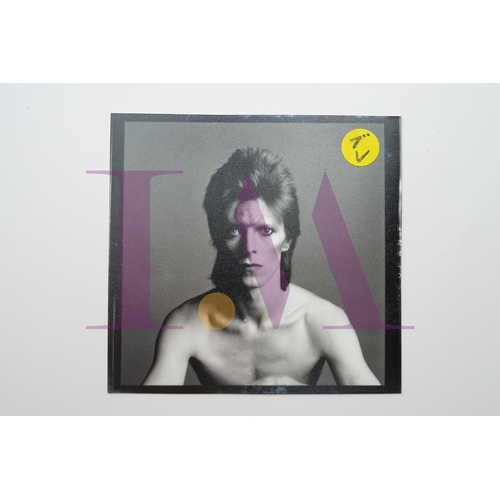 354 - DAVID BOWIE - Cut Contact Sheets Sukita Photo collection.
This black velvet hard cover book has been... 