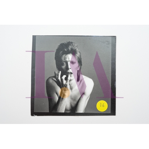 354 - DAVID BOWIE - Cut Contact Sheets Sukita Photo collection.
This black velvet hard cover book has been... 