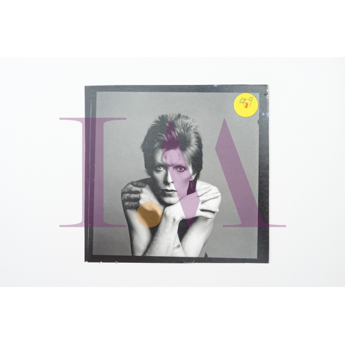 354 - DAVID BOWIE - Cut Contact Sheets Sukita Photo collection.
This black velvet hard cover book has been... 