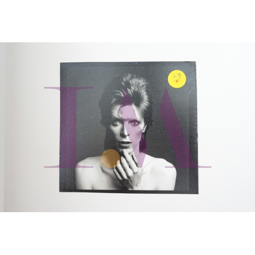 354 - DAVID BOWIE - Cut Contact Sheets Sukita Photo collection.
This black velvet hard cover book has been... 