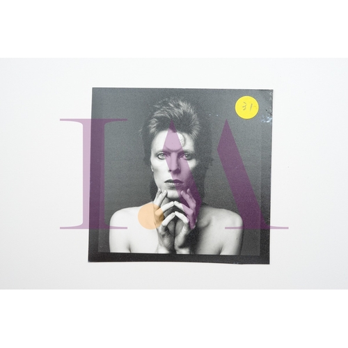 354 - DAVID BOWIE - Cut Contact Sheets Sukita Photo collection.
This black velvet hard cover book has been... 