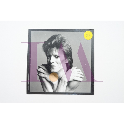 354 - DAVID BOWIE - Cut Contact Sheets Sukita Photo collection.
This black velvet hard cover book has been... 