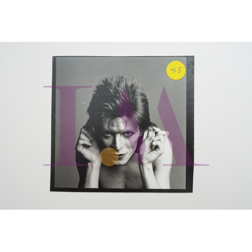 354 - DAVID BOWIE - Cut Contact Sheets Sukita Photo collection.
This black velvet hard cover book has been... 