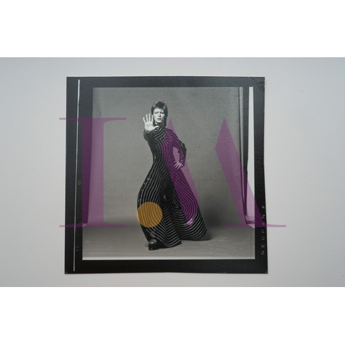 354 - DAVID BOWIE - Cut Contact Sheets Sukita Photo collection.
This black velvet hard cover book has been... 