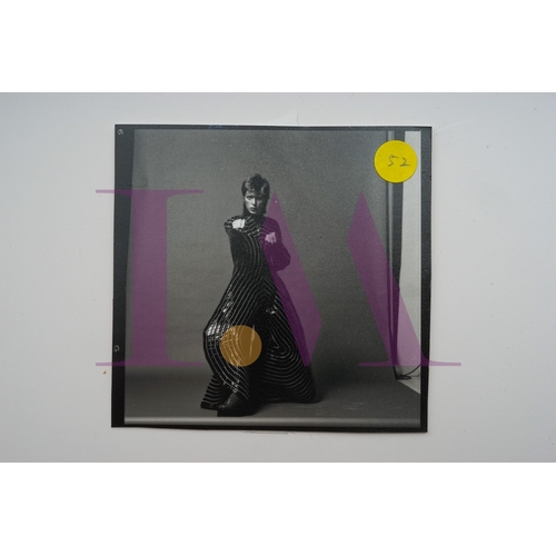 354 - DAVID BOWIE - Cut Contact Sheets Sukita Photo collection.
This black velvet hard cover book has been... 