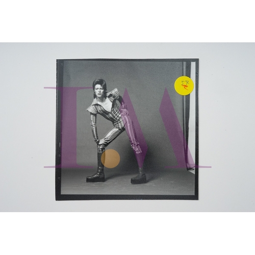 354 - DAVID BOWIE - Cut Contact Sheets Sukita Photo collection.
This black velvet hard cover book has been... 