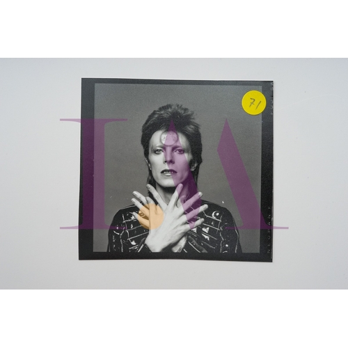 354 - DAVID BOWIE - Cut Contact Sheets Sukita Photo collection.
This black velvet hard cover book has been... 