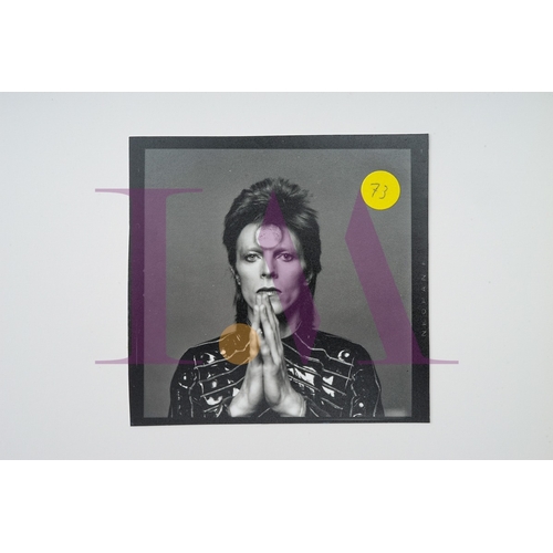 354 - DAVID BOWIE - Cut Contact Sheets Sukita Photo collection.
This black velvet hard cover book has been... 