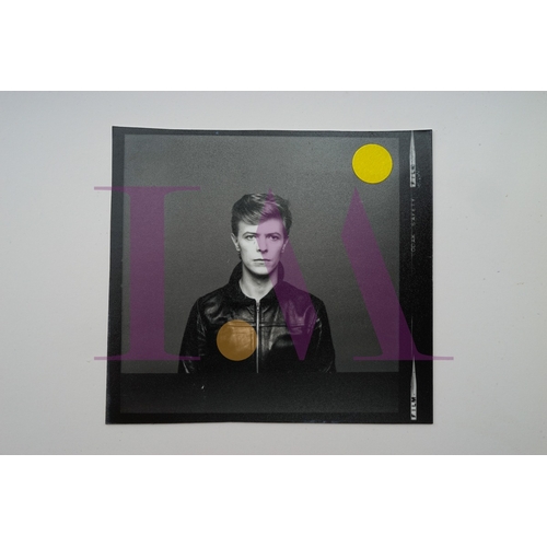 354 - DAVID BOWIE - Cut Contact Sheets Sukita Photo collection.
This black velvet hard cover book has been... 