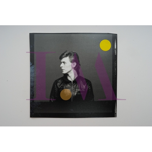 354 - DAVID BOWIE - Cut Contact Sheets Sukita Photo collection.
This black velvet hard cover book has been... 