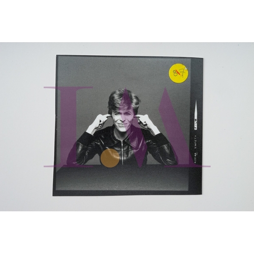 354 - DAVID BOWIE - Cut Contact Sheets Sukita Photo collection.
This black velvet hard cover book has been... 