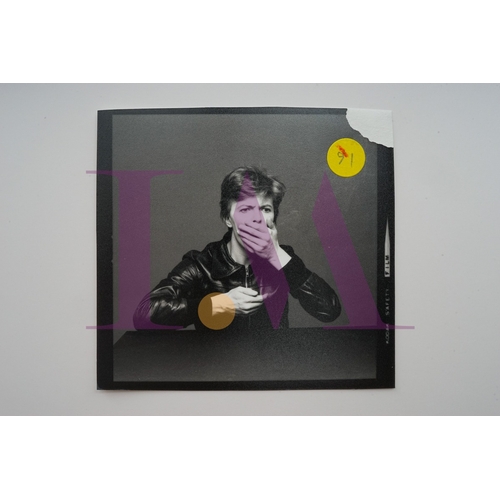 354 - DAVID BOWIE - Cut Contact Sheets Sukita Photo collection.
This black velvet hard cover book has been... 