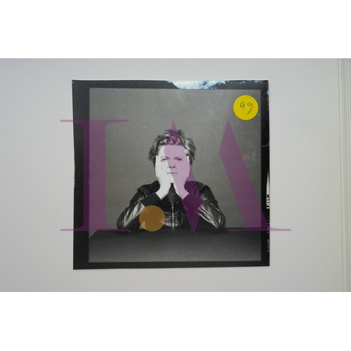 354 - DAVID BOWIE - Cut Contact Sheets Sukita Photo collection.
This black velvet hard cover book has been... 