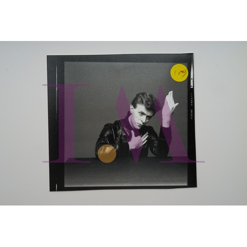 354 - DAVID BOWIE - Cut Contact Sheets Sukita Photo collection.
This black velvet hard cover book has been... 