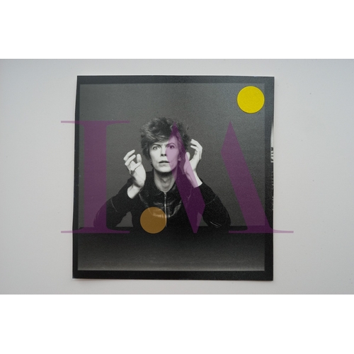 354 - DAVID BOWIE - Cut Contact Sheets Sukita Photo collection.
This black velvet hard cover book has been... 