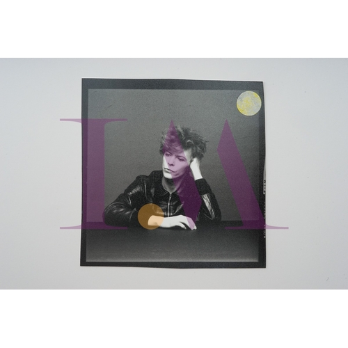 354 - DAVID BOWIE - Cut Contact Sheets Sukita Photo collection.
This black velvet hard cover book has been... 