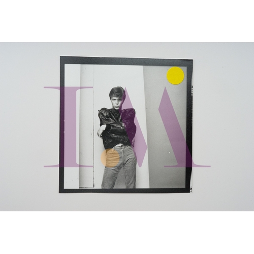 354 - DAVID BOWIE - Cut Contact Sheets Sukita Photo collection.
This black velvet hard cover book has been... 