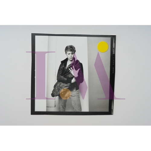 354 - DAVID BOWIE - Cut Contact Sheets Sukita Photo collection.
This black velvet hard cover book has been... 