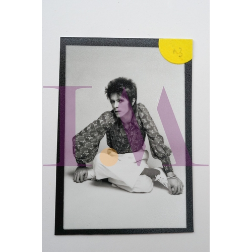 354 - DAVID BOWIE - Cut Contact Sheets Sukita Photo collection.
This black velvet hard cover book has been... 