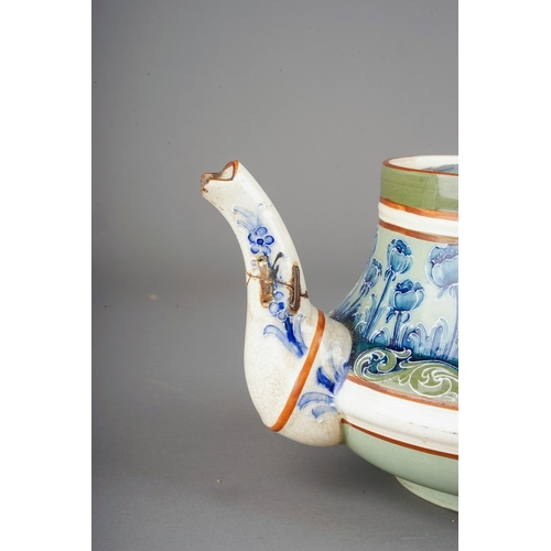 362 - A Moorcroft Macintyre tea pot of squat baluster form, tube line decorated with blue poppies on a gre... 