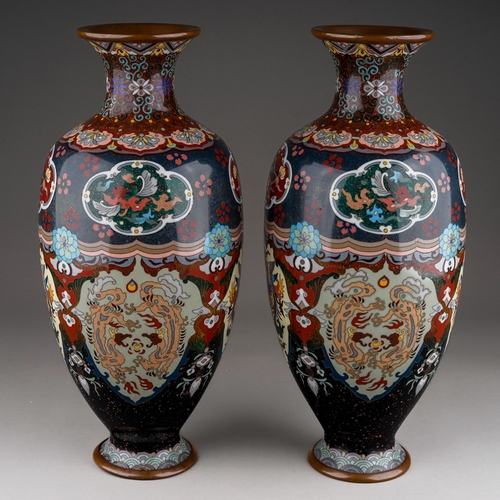 365 - A pair of early 20th century cloisonne ovoid vases, decorated with panels of dragons, exotic birds a... 