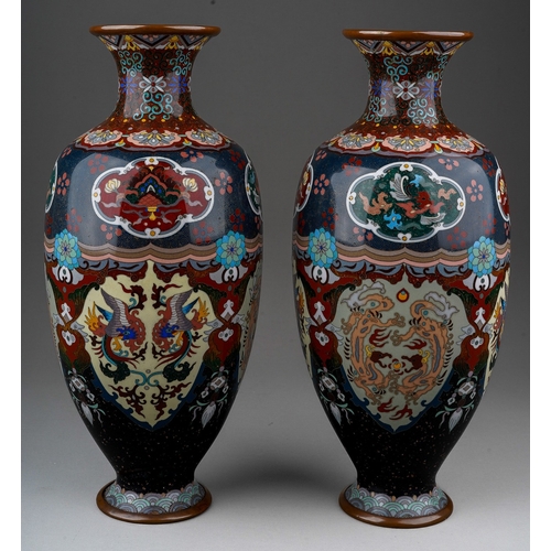 365 - A pair of early 20th century cloisonne ovoid vases, decorated with panels of dragons, exotic birds a... 